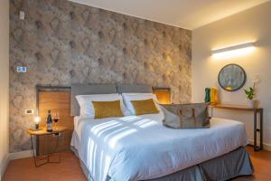 Postel nebo postele na pokoji v ubytování Braida Wine Resort