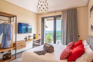 Postel nebo postele na pokoji v ubytování Braida Wine Resort