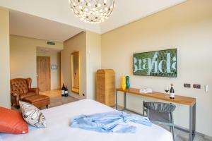 Postel nebo postele na pokoji v ubytování Braida Wine Resort