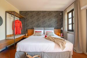 Postel nebo postele na pokoji v ubytování Braida Wine Resort