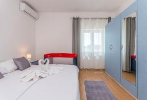Postel nebo postele na pokoji v ubytování Villa Branko + 48 fotografií