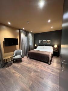Hotel Nord 1901客房内的一张或多张床位