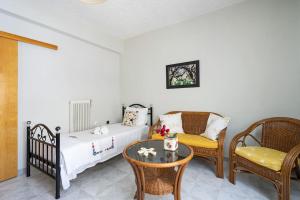 Postel nebo postele na pokoji v ubytování Cozy Apartment 2