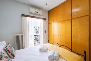 Postel nebo postele na pokoji v ubytování Cozy Apartment 2