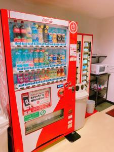 a cocacola soda vending machine in a store at Inuyama City Hotel in Inuyama