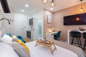 a living room with a couch and a table at Apartments & rooms SIX in Rijeka