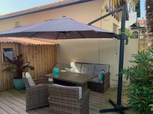 Patio nebo venkovní prostory v ubytování Arcachonnaise de charme première ligne vue mer