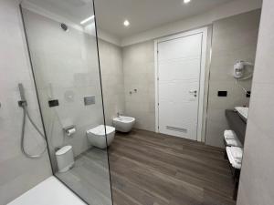 Koupelna v ubytování RoccaRegina Hotel