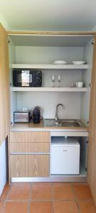 A kitchen or kitchenette at Casas da Barra