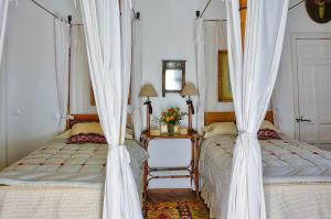 Een bed of bedden in een kamer bij Casa Deluxe en condominio