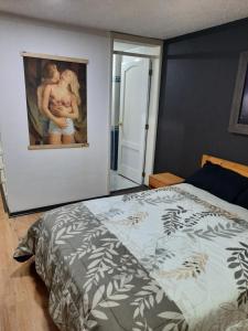 מיטה או מיטות בחדר ב-Hospedaje Aguaclara
