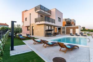 an image of a villa with a swimming pool at Villa Kate ZadarVillas in Knežević