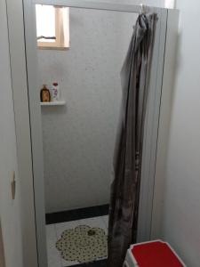 a shower with a shower curtain in a bathroom at Sole, Mare e Relax a Matino La Tua Oasi Salentina in Matino +13 photos