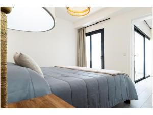 Posteľ alebo postele v izbe v ubytovaní Casa Tiare