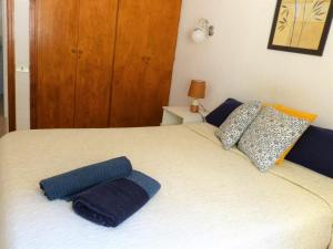 Postel nebo postele na pokoji v ubytování Suncanarias Apartamento Los Angeles