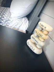 a stack of towels with the words lost at the lake and changes sidx sidx sidx at TeePee Room 9-Newly Renovated in Roscommon