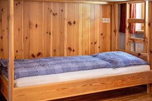 Letto o letti in una camera di Lindenhof Apt 1
