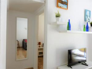 TV a/nebo společenská místnost v ubytování Suncanarias Apartamento Los Angeles