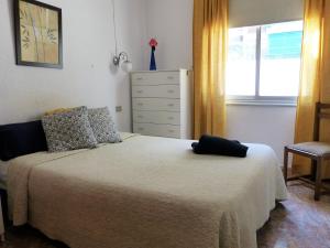 Postel nebo postele na pokoji v ubytování Suncanarias Apartamento Los Angeles