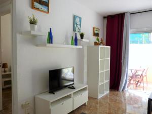 TV a/nebo společenská místnost v ubytování Suncanarias Apartamento Los Angeles