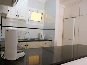 Kuchyň nebo kuchyňský kout v ubytování Suncanarias Apartamento Los Angeles