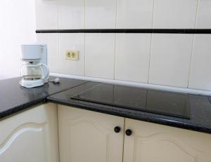 Kuchyň nebo kuchyňský kout v ubytování Suncanarias Apartamento Los Angeles