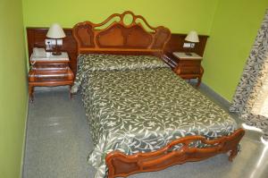 Кровать или кровати в номере Hotel Don Pelayo