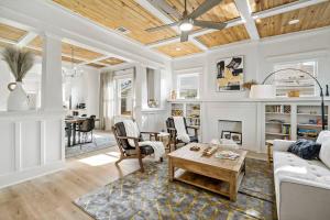 a living room with a couch and a table at Urban Elegance Retreat in San Antonio