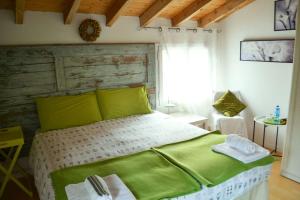 Postel nebo postele na pokoji v ubytování B&B Cappuccini