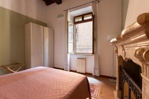 A bed or beds in a room at CasaLonghi