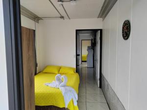Postel nebo postele na pokoji v ubytování Hospedaje Eli 09