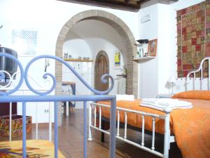 A bed or beds in a room at Vico Del Poeta