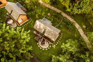 an overhead view of a house in a garden at Glamping Mountain Fairy Tale in Bistrica pri Tržiču