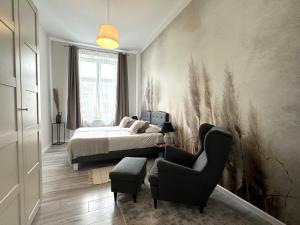 Katil atau katil-katil dalam bilik di Apartament Wroclawia
