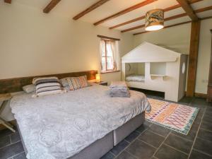 a bedroom with a large bed in a room at Woodcutters in Launceston