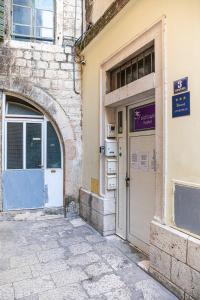 an entrance to a building with a door at Within Ancient Walls in Split