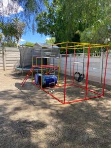 a playground with a play equipment in a yard at ikibiki in Beaufort West