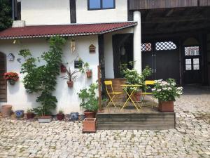 Vonkajšia záhrada v ubytovaní Au Relais de l'Histoire Gîte classé 4 étoiles