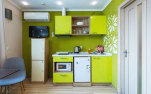 Una cocina o zona de cocina en Guest house "Golden Gate 911 "
