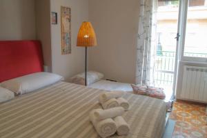 Posteľ alebo postele v izbe v ubytovaní Il Gabbiano