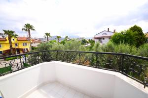 a balcony with a view of a city at Fethiye Apart Otel in Fethiye