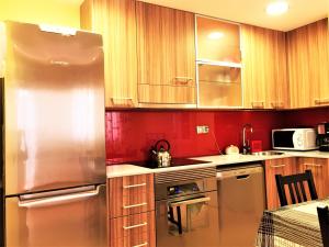 مطبخ أو مطبخ صغير في Lloret Paradise Apartments