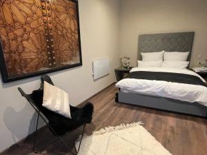 Postel nebo postele na pokoji v ubytování YVES Marrakech