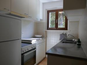 Kuchyň nebo kuchyňský kout v ubytování Apartment Lara by Interhome + 28 fotografií
