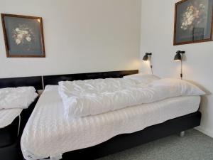 Postel nebo postele na pokoji v ubytování Apartment Krstana - 100m from the sea in Western Jutland by Interhome