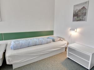 Postel nebo postele na pokoji v ubytování Apartment Teemu - 100m from the sea in Western Jutland by Interhome