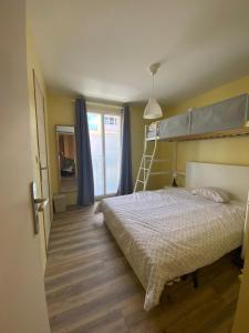 Voodi või voodid majutusasutuse Bohobos Hostel toas