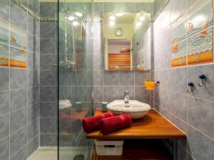 a bathroom with a sink and a shower at Studio Les Regates-3 by Interhome in Hyères
