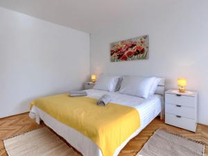 Postel nebo postele na pokoji v ubytování Holiday Home Reaa by Interhome