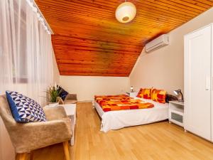 Ένα ή περισσότερα κρεβάτια σε δωμάτιο στο Holiday Home Dior by Interhome